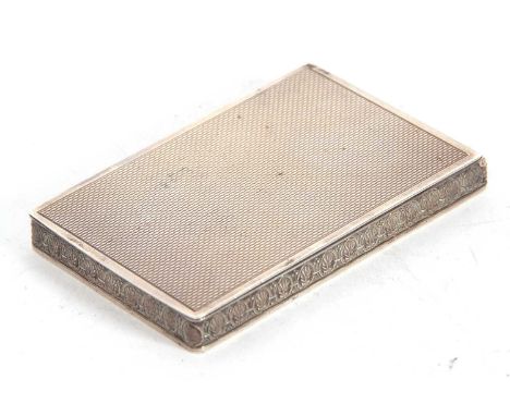 George VI silver ladies compact of rectangular form, hinged engined turned lid with mirror inset, a plain base with shell det