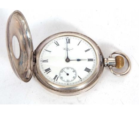 A silver case Waltham Traveller Half Hunter pocket watch, crown wound movement, white enamel dial with Roman numeral hour mar
