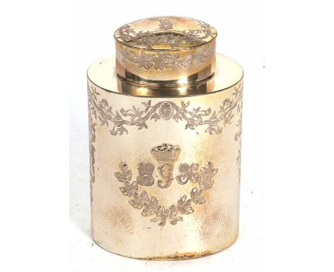 An early 20th Century silver plated tea caddy of oval form, the front decorated with a family crest, possibly that of the Ear