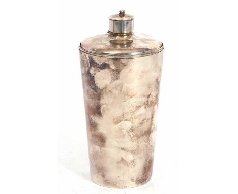 An Edwardian silver plated flask and three beakers of tapering cylindrical form, screw on cap, fitting inside three graduated