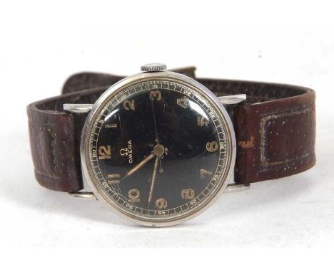 A vintage Omega 30T2 gents wristwatch, manually crown wound movement, black dial with Arabic numeral hour markers, circa 1950