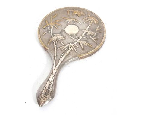 A late 19th/early 20th Century Chinese Export hand-held silver mirror with bamboo and birds on a matted ground, stamped Hungc