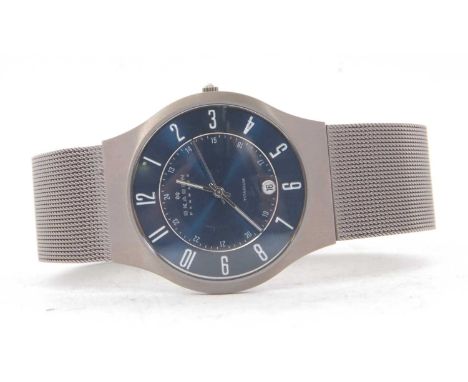 A Skagen titanium gents wristwatch, quartz movement, blue dial with Arabic numeral hour markers and date aperture, box and ma