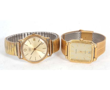 Two wristwatches, one Accurist and one Timex, both watches have champagne dials with baton hour markers and date apertures al