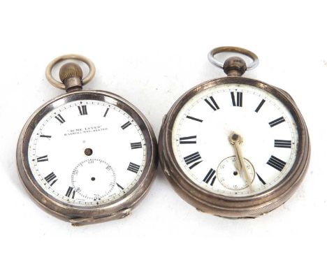Two pocket watches consisting of one white metal H Samuel Acme Lever and the other a silver cased open face pocket watch, bot