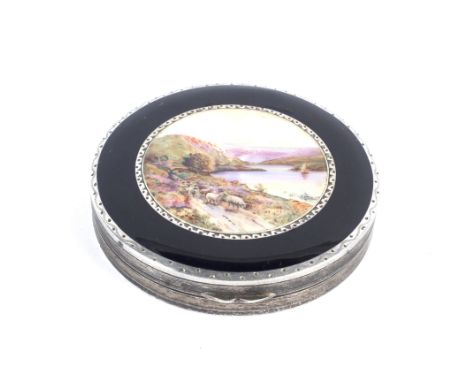 Houbigant, a vintage silver and enamel compact. The circular enamel cover decorated with Highland pastoral landscape within a