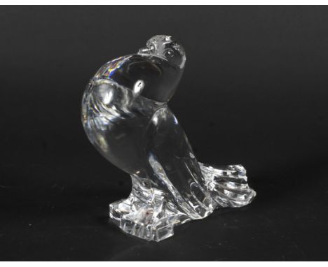 A 20th century Steuben glass model of a stylised dove. Etched mark to base, 17.5cm high