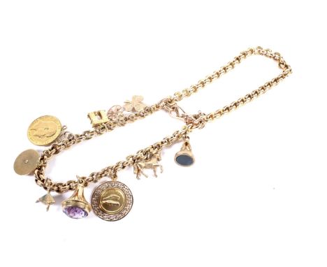 An early 20th century gold fancy link chain adapted as a two-row 'charm' bracelet. Each link stamped '15' &amp; '0.625', on a
