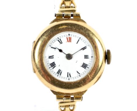 Swiss, a lady's 18ct cased bracelet watch, circa 1915. The white enamel dial with red 12 and black painted Roman numerals. th
