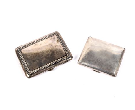 A silver mounted purse and a silver cigarette case. The first with a shaped border and a green leather interior, 95g gross