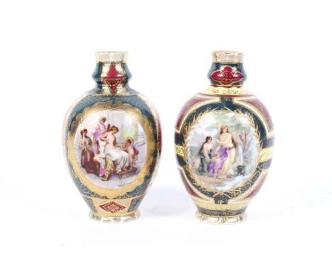 A pair of Vienna-style porcelain oviform vases, circa 1900. Each painted with spurious shield marks, each printed and painted