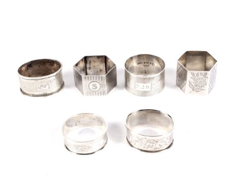 Six assorted silver napkin rings. Comprising two oval, two circular and two octagonal, three with engine turned decoration an