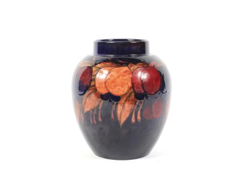 An early 20th century Moorcroft Plum pattern blue-ground ginger jar. Printed, painted and impressed marks, tubelined with plu
