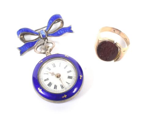 An early 20th century Continental white metal and enamel keyless fob watch and a gold signet ring. The fob watch with a keyle