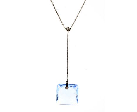 A modern Italian 18ct white gold, blue synthetic spinel and diamond pendant necklace. The fine box-link chain on a lobster-cl