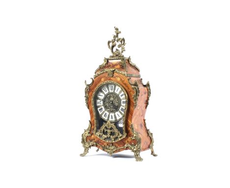 A German (Franz Hermle &amp; Sons) Louix XV style gilt-metal mounted mantel clock. Of rocaille form, mounted with acanthus, w