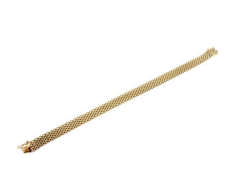 A vintage Italian gold mesh bracelet. The push snap with Italian marks and stamped '750', 8mm wide, 18.5cm long (7 1/4 inches