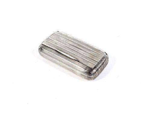 A George III silver reeded oblong snuff box. The maker's mark 'W C(?)' rubbed, London 1805, 8.5cm long, 87g