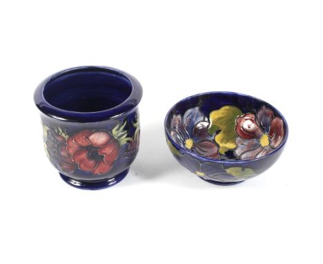 A Moorcroft blue ground Anemone pattern bowl and a planter. Printed, painted and impressed marks, each tubelined with a band 