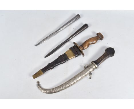 TWO DAGGERS AND TWO SPEAR TIPS, the daggers include an Arabic style one with a wooden handle, curved blade and an ornate whit