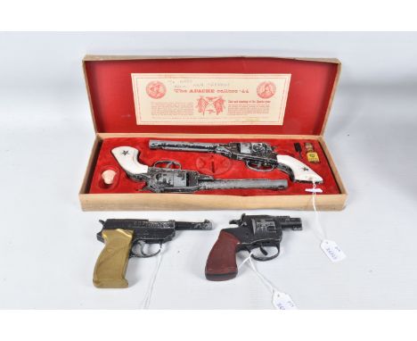 A BOXED BCM OUTLAW CAP GUNS SET, comprising two replica Remington Apache revolvers, both appear complete but in playworn cond