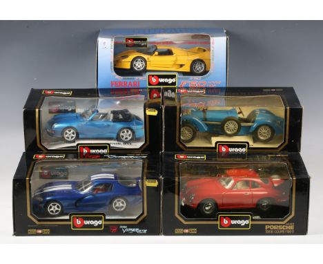 A collection of 1:18 scale model cars, including Bburago F-50, Maisto BMW Z8 and UT Models BMW M Coupé, some boxed.Buyer’s Pr