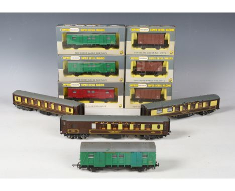 A collection of Wrenn gauge OO railway items, including coaches and goods rolling stock in various liveries, some boxed (play