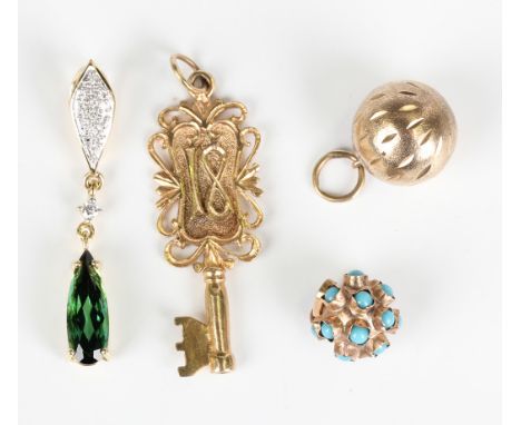 An 18ct gold, green tourmaline and diamond pendant, the front with an elongated pear shaped green tourmaline, mounted with ci