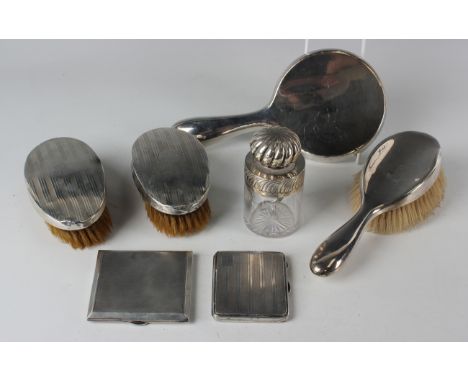 Two George V silver engine turned cigarette cases, London 1923 and Birmingham 1924, total weight 234.5g, a Victorian silver m