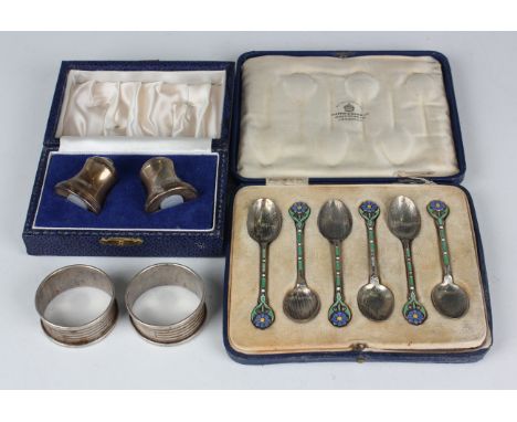 A set of six George V silver and enamelled coffee spoons with floral motifs to the handles, Birmingham 1929 by Mappin &amp; W