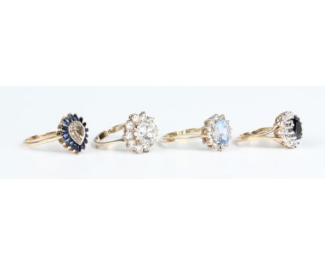 A 9ct gold, sapphire and diamond oval cluster ring, ring size approx M, a 9ct gold, pale blue and colourless gem set oval clu