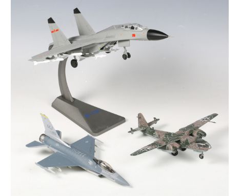 A Dragon Wings 1:72 scale model F-16C Fighting Falcon, together with ten other model aircraft.Buyer’s Premium 29.4% (includin