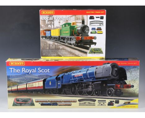 A collection of gauge OO railway items, comprising Hornby R.1094 The Royal Scot train set, R.1085 Local Freight train set, DC