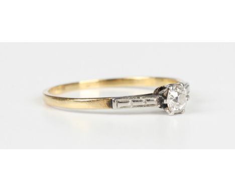 A gold and diamond single stone ring, claw set with a cushion cut diamond, unmarked, weight 1.5g, ring size approx R.Buyer’s 