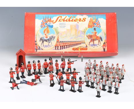 A collection of Crescent Toys lead figures, including sentries and sentry box, cavalry, Life Guards, trumpeters on horseback,