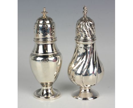 A George V silver baluster sugar caster, the pierced domed cover above a spiral reeded body on a circular foot, London 1912 b