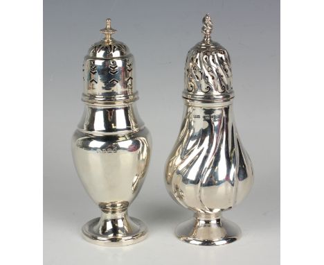 A George V silver baluster sugar caster, the pierced domed cover above a spiral reeded body on a circular foot, London 1912 b