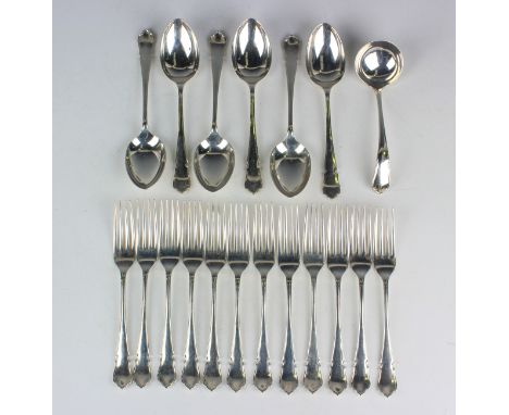 An Elizabeth II part canteen of silver cutlery, comprising six tablespoons, twelve table knives and forks, twelve dessert kni