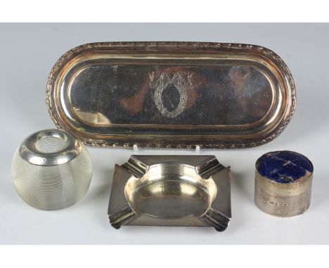 A small group of silver and silver mounted wares, comprising a small trinket tray, Birmingham 1906, length 23.1cm, an ashtray