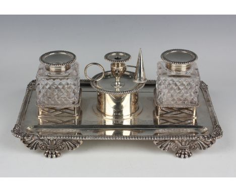 A late Victorian silver rectangular inkstand, the centre with a cylindrical box surmounted with a detachable chamberstick and
