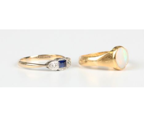 A 22ct gold ring, collet set with an oval opal, Birmingham 1922, weight 4.1g, ring size approx J1/2, and a gold, platinum, sa