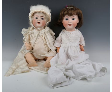 A Simon &amp; Halbig K &amp; R bisque head doll, impressed '126', with blonde wig, sleeping blue eyes, open mouth and bent li