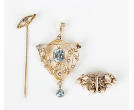 An Edwardian gold, seed pearl and pale blue gem set pendant brooch, detailed '9ct', weight 4g, length 5cm (two pearls lacking