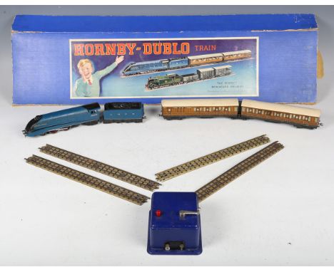 A pre-war Hornby Dublo three-rail electric Sir Nigel Gresley train set, comprising locomotive 4498, tender, pair of articulat