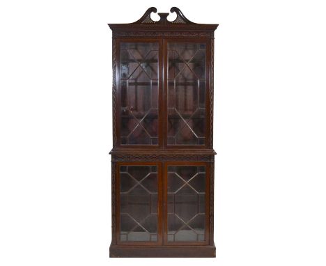 Victorian Chippendale Revival mahogany cabinet, swan neck pediment, dentil cornice and blind fretwork frieze, astragal glazed