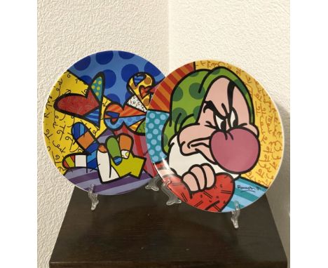 Romero Britto - Peace and Love &amp; GrumpySet of 2 ceramic decorative plates designed by Britto. Good condition, diam. 21 cm
