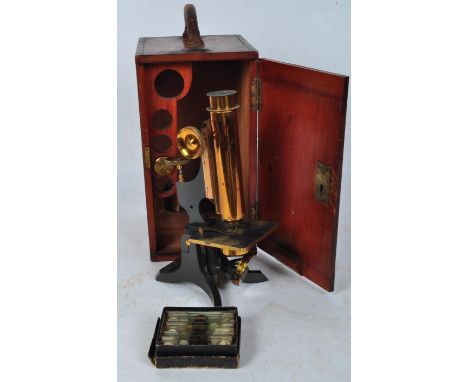 Of scientific interest - A early 20th century brass Watsons &amp; Sons microscope. The microscope stamped W.Watson &amp; Sons