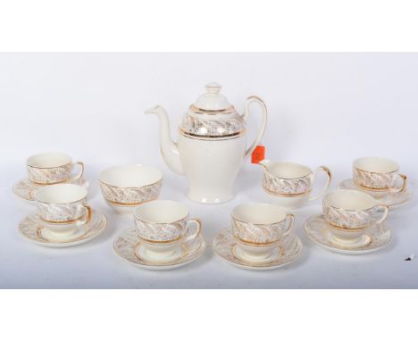 A vintage retro mid 20th century circa. 1950's Palissy bone china tea service comprising of coffee pot, six teacups, saucers,