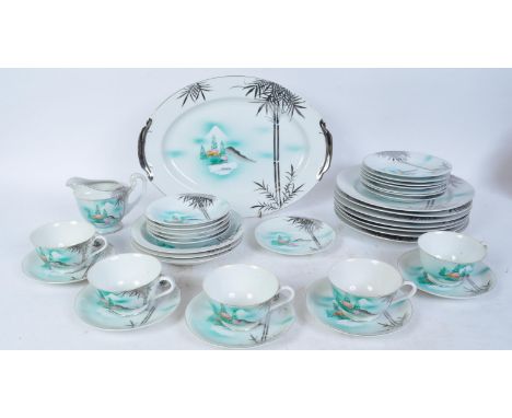 A vintage retro 20th century 'Kutani' Chinese hand painted tea / dinner service. Each piece being hand painted with rural Chi
