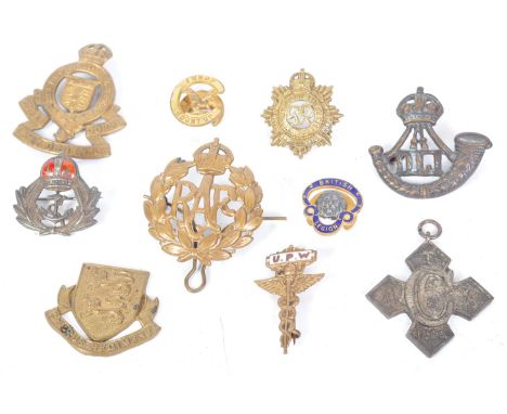 A collection of WWI WW1 World War One &amp; later regimental metal badges to include a Royal Army Ordinance Corps badge, RAF 